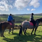 two people on horses